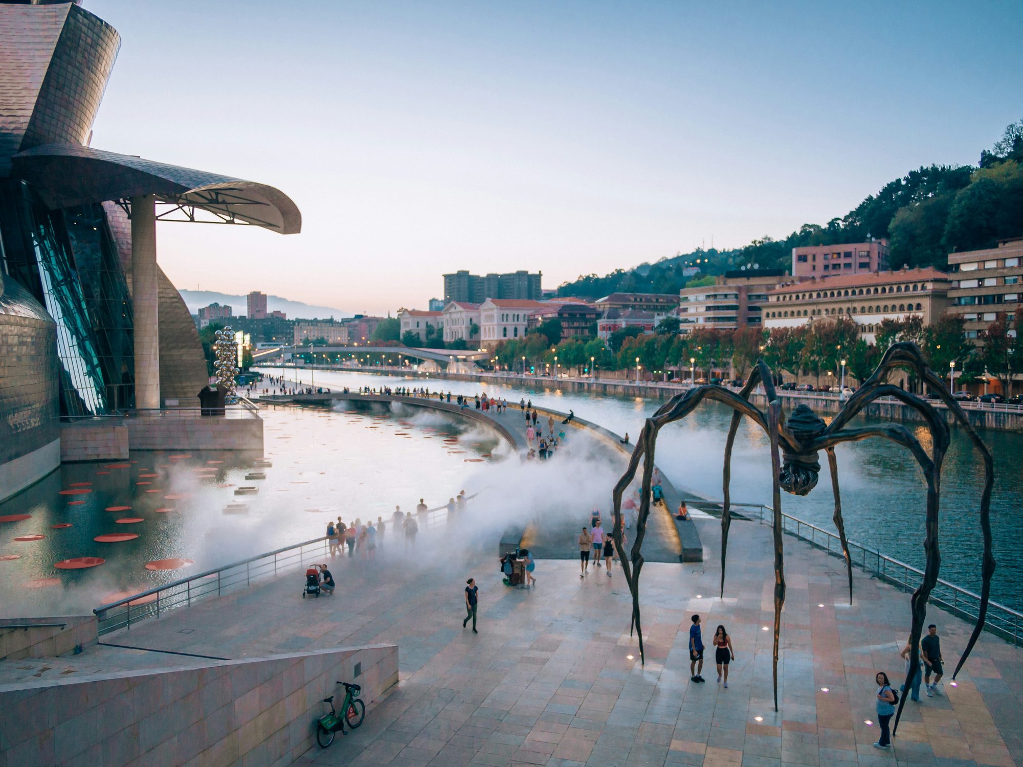 Bilbao Guggenheim and Maman sculpture along the Nervión River